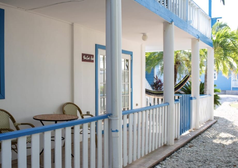 The Coral Suite at The Odyssey Dive Resort Utila is a 1 bedroom suite with a full kitchen and sitting area. Outside we provide you with drying racks for your scuba gear.